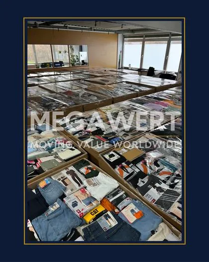 Pallets of European clothing and textiles, ready for shipment