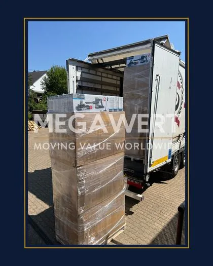 Loading a pallet of goods onto a truck at the MEGA WERT warehouse